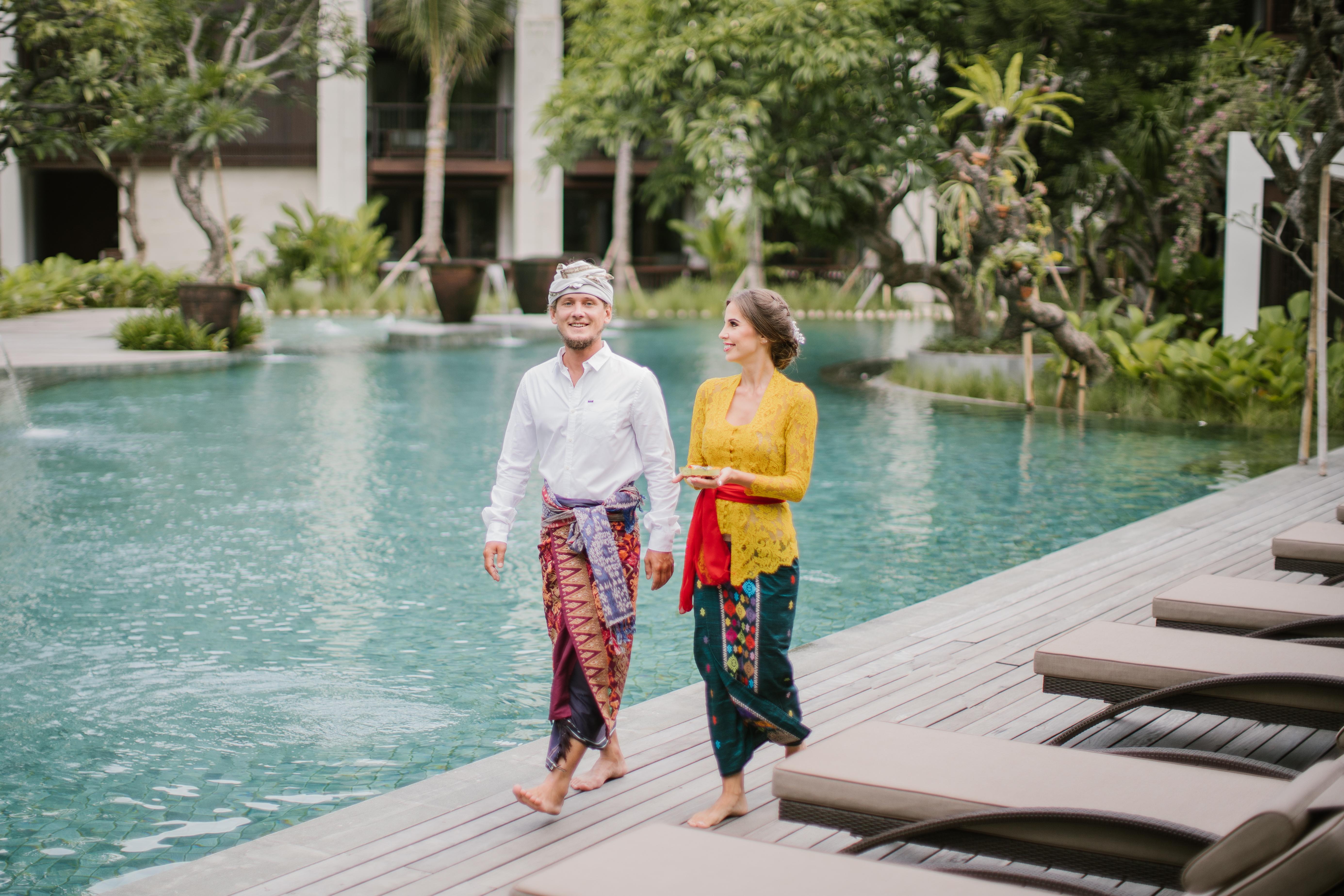 Ramayana Suites And Resort Kuta  Exterior photo A Balinese couple wearing traditional Balinese attire